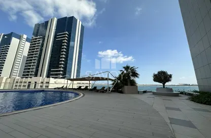 صورة لـ حوض سباحة شقة - 2 غرف نوم - 3 حمامات للايجار في برج وجه البحر - شمس أبوظبي - جزيرة الريم - أبوظبي ، صورة رقم 1