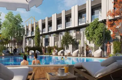Townhouse - 2 Bedrooms - 3 Bathrooms for sale in Reportage Village 1 - Dubai Land - Dubai