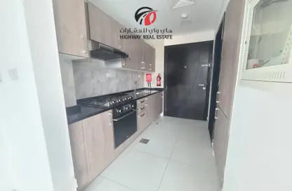 Apartment - 1 Bathroom for rent in Saleh Bin Lahej Building - Majan - Dubai