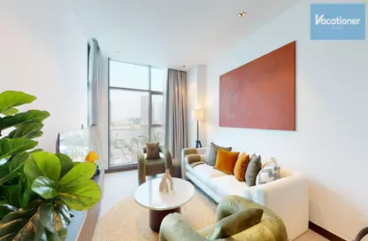 صورة لـ غرفة المعيشة شقة - غرفة نوم - 1 حمام للايجار في 15 نورث سايد - الخليج التجاري - دبي ، صورة رقم 1