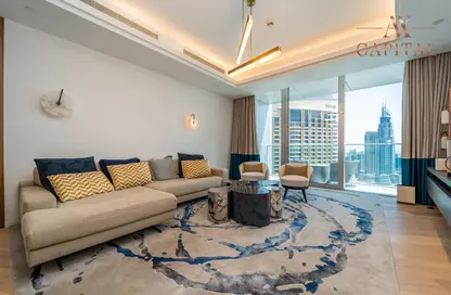 صورة لـ غرفة المعيشة شقة - 2 غرف نوم - 4 حمامات للايجار في جادة كمبينسكي - دبي وسط المدينة - دبي ، صورة رقم 1