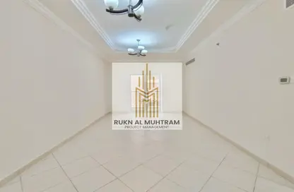 شقة - غرفة نوم - 2 حمامات للايجار في مبني آمان - تجارية مويلح - الشارقة