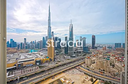 Outdoor Building image for: Apartment - 3 Bedrooms - 4 Bathrooms for sale in Downtown Views II Tower 3 - Downtown Views II - Downtown Dubai - Dubai, Image 1