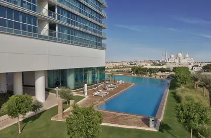 Apartment - 1 Bedroom - 2 Bathrooms for rent in Rihan Heights - Grand Mosque District - Abu Dhabi