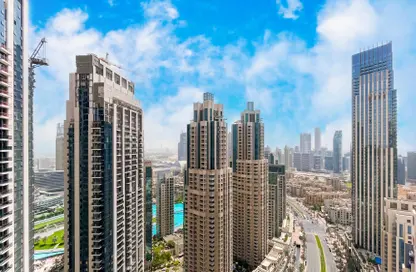 Apartment - 3 Bedrooms - 3 Bathrooms for rent in Boulevard Crescent Tower 1 - BLVD Crescent - Downtown Dubai - Dubai