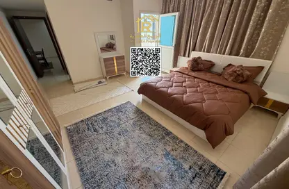 شقة - غرفة نوم - 2 حمامات للايجار في أورينت تاور 1 - أورينت تاور - البستان - عجمان