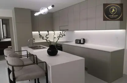 صورة لـ مطبخ شقة - 2 غرف نوم - 3 حمامات للبيع في إكويتي أركيد - الفرجان - دبي ، صورة رقم 1