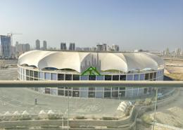 Outdoor Building image for: Apartment - 2 bedrooms - 3 bathrooms for sale in Stadium Point - Dubai Sports City - Dubai, Image 1
