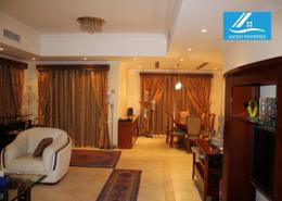 Living / Dining Room image for: Duplex - 4 bedrooms - 4 bathrooms for rent in The Townhouses at Al Hamra Village - Al Hamra Village - Ras Al Khaimah, Image 1
