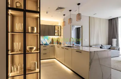 صورة لـ مطبخ شقة - 2 غرف نوم - 3 حمامات للبيع في سكن RA1N - قرية الجميرا سركل - دبي ، صورة رقم 1