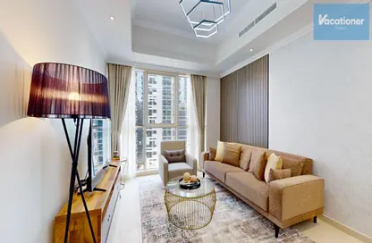 Living Room image for: Apartment - 1 Bedroom - 1 Bathroom for rent in Dunya Tower - Burj Khalifa Area - Downtown Dubai - Dubai, Image 1