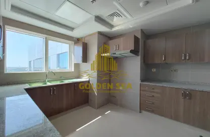 Kitchen image for: Apartment - 1 Bedroom - 2 Bathrooms for rent in Khalifa City A - Khalifa City - Abu Dhabi, Image 1