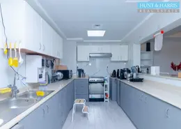 Kitchen image for: Townhouse - 4 Bedrooms - 4 Bathrooms for sale in The Townhouses at Al Hamra Village - Al Hamra Village - Ras Al Khaimah, Image 1