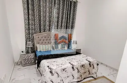 Apartment - 2 Bedrooms - 2 Bathrooms for sale in Oasis Tower - Al Rashidiya 1 - Al Rashidiya - Ajman