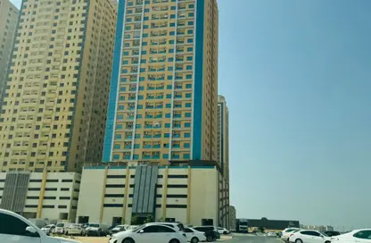 Apartment - 1 Bedroom - 1 Bathroom for sale in Paradise Lakes Towers - Emirates City - Ajman