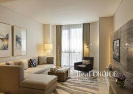 صورةغرفة المعيشة لـ: النزل و الشقق الفندقية - 2 غرف نوم - 3 حمامات للكراء في البندر روتانا - كريك - شارع بني ياس - ديرة - دبي, صورة 1