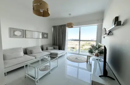 Living Room image for: Apartment - 1 Bedroom - 1 Bathroom for sale in Carson B - Carson - DAMAC Hills - Dubai, Image 1