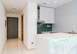 صورةمطبخ لـ: Studio - 1 حمام للبيع في برج بلو ويفز - مجمع دبي ريزيدنس - دبي, صورة 1