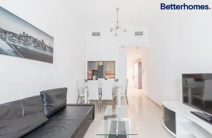 Living / Dining Room image for: Apartment - 1 Bedroom - 1 Bathroom for sale in Dream Tower - Dubai Marina - Dubai, Image 1