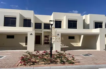 Outdoor Building image for: Townhouse - 3 Bedrooms - 4 Bathrooms for rent in Reem Townhouses - Town Square - Dubai, Image 1
