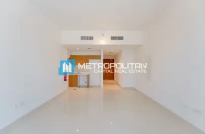 Empty Room image for: Apartment - 1 Bathroom for sale in Julfar Residence - City Of Lights - Al Reem Island - Abu Dhabi, Image 1