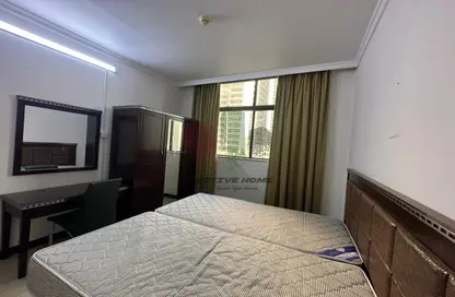 صورة لـ غرفة- غرفة النوم شقة - غرفة نوم - 1 حمام للايجار في برج ماكين - منطقة النادي السياحي - أبوظبي ، صورة رقم 1