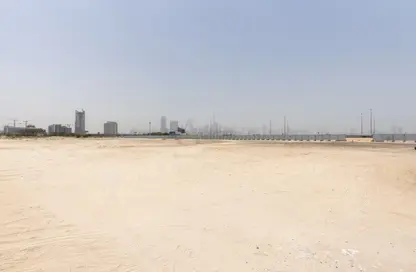 Land - Studio for sale in Queue Point - Liwan - Dubai Land - Dubai