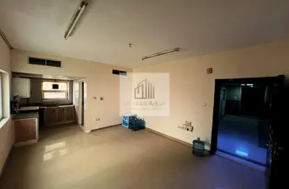 Empty Room image for: Apartment - 1 Bathroom for rent in Al Butina 9 Building - Al Butina - Sharjah, Image 1