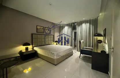 صورة لـ غرفة- غرفة النوم شقة - غرفة نوم - 2 حمامات للايجار في داماك ماجستين - الخليج التجاري - دبي ، صورة رقم 1