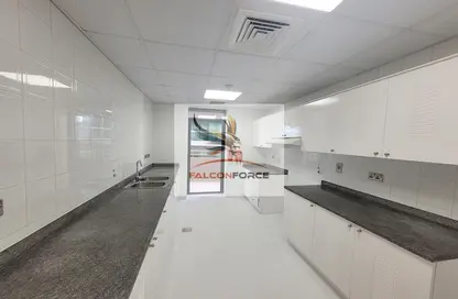 صورة لـ مطبخ شقة - 2 غرف نوم - 3 حمامات للايجار في برج دي ايكس بي - شارع الشيخ زايد - دبي ، صورة رقم 1