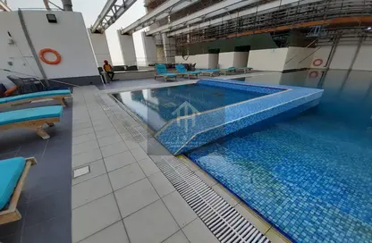 صورة لـ حوض سباحة شقة - غرفة نوم - 2 حمامات للايجار في دانة بو ظبي - أبوظبي ، صورة رقم 1