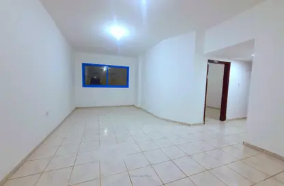 Empty Room image for: Apartment - 2 Bedrooms - 2 Bathrooms for rent in Ibtikar 2 - Al Majaz 2 - Al Majaz - Sharjah, Image 1