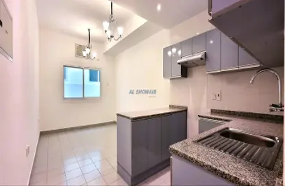 Kitchen image for: Apartment - 1 Bathroom for rent in Naif - Deira - Dubai, Image 1