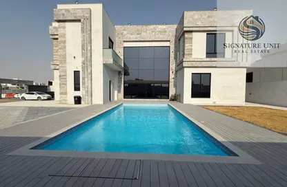 Villa - 5 Bedrooms - 7 Bathrooms for rent in Wadi Alshabak - Dubai