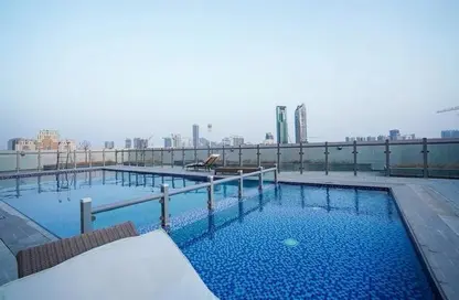 صورة لـ حوض سباحة شقة - 1 حمام للايجار في برج سيدني - قرية الجميرا سركل - دبي ، صورة رقم 1