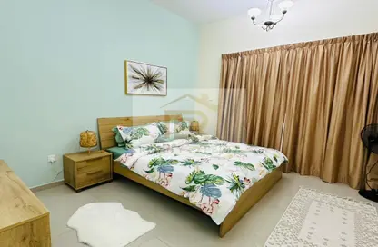 Room / Bedroom image for: Apartment - 1 Bedroom - 1 Bathroom for rent in Madison Columbus - Majan - Dubai, Image 1