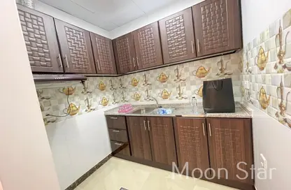 Kitchen image for: Apartment - 1 Bedroom - 1 Bathroom for rent in Khalifa City A - Khalifa City - Abu Dhabi, Image 1