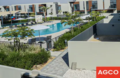 Pool image for: Villa - 4 Bedrooms - 4 Bathrooms for sale in Cherrywoods - Dubai Land - Dubai, Image 1