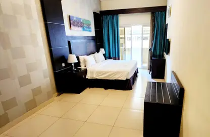 Room / Bedroom image for: Apartment - 2 Bedrooms - 2 Bathrooms for rent in Al Barsha 1 - Al Barsha - Dubai, Image 1