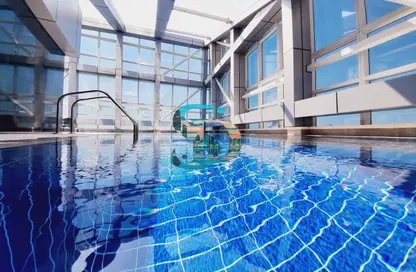 Pool image for: Apartment - 1 Bedroom - 2 Bathrooms for rent in Hamdan Street - Abu Dhabi, Image 1