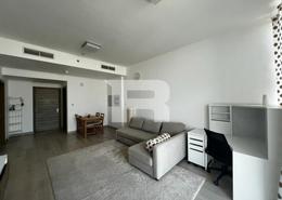 Living Room image for: Apartment - 1 bedroom - 2 bathrooms for rent in Bloom Towers B - Bloom Towers - Jumeirah Village Circle - Dubai, Image 1