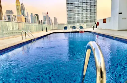 Apartment - 1 Bedroom - 2 Bathrooms for rent in Jumeirah Garden City - Al Satwa - Dubai