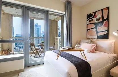 Room / Bedroom image for: Apartment - 1 Bathroom for rent in 29 Burj Boulevard Tower 2 - 29 Burj Boulevard - Downtown Dubai - Dubai, Image 1