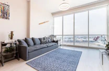 Living Room image for: Apartment - 2 Bedrooms - 2 Bathrooms for sale in Hilliana Tower - Acacia Avenues - Al Sufouh - Dubai, Image 1