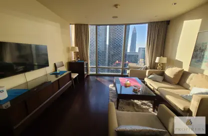 Living Room image for: Apartment - 1 Bedroom - 1 Bathroom for rent in Burj Khalifa - Burj Khalifa Area - Downtown Dubai - Dubai, Image 1