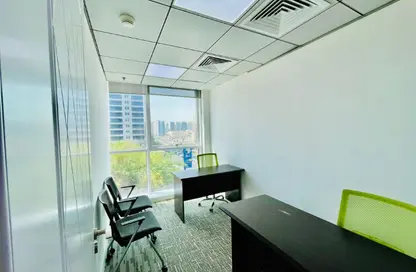 Office Space - Studio - 4 Bathrooms for rent in Hamdan Street - Abu Dhabi