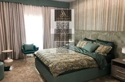 Apartment - 1 Bedroom - 2 Bathrooms for sale in Orient Tower 2 - Orient Towers - Al Bustan - Ajman