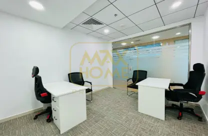 Office Space - Studio - 4 Bathrooms for rent in Hamdan Street - Abu Dhabi