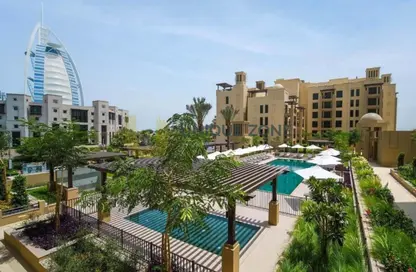 Pool image for: Apartment - 1 Bedroom - 1 Bathroom for rent in Rahaal 2 - Madinat Jumeirah Living - Umm Suqeim - Dubai, Image 1