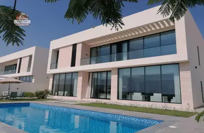 Pool image for: Villa - 5 Bedrooms - 7 Bathrooms for rent in Golf Community - Al Zorah - Ajman, Image 1